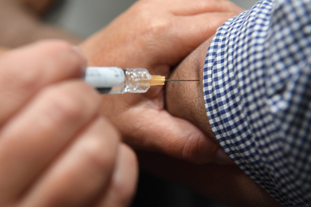 A Fair Work official says mandatory immunisation could not be justified in 