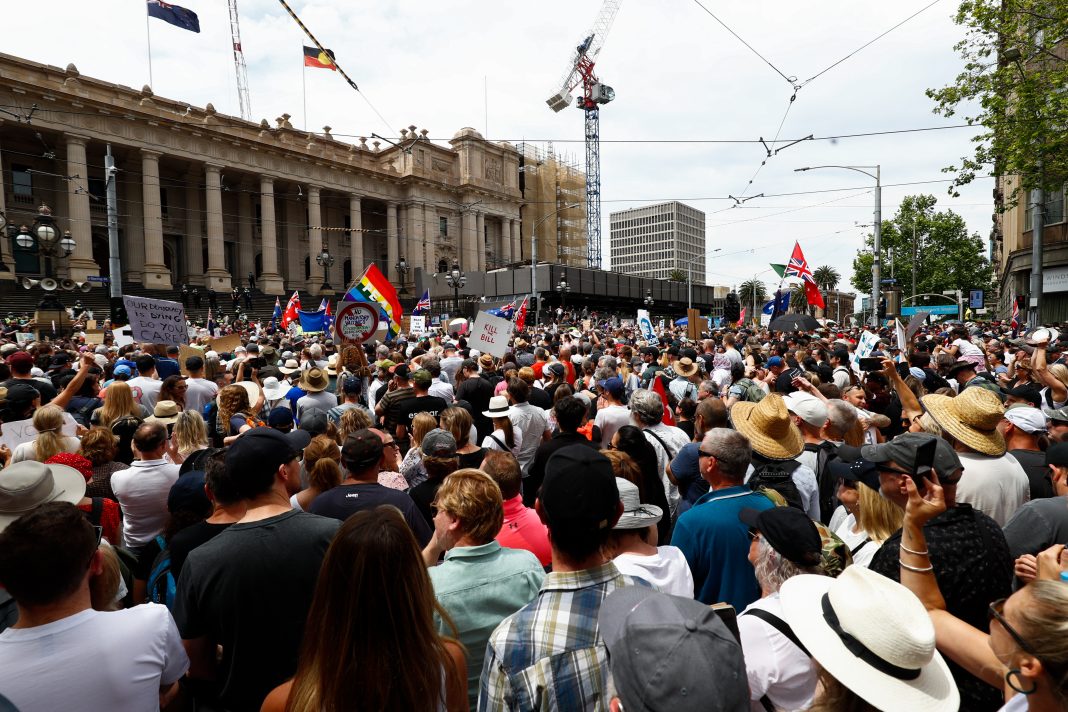 Demonstrators have gathered outside state parliament in Melbourne to protest proposed pandemic laws. (Con Chronis/AAP PHOTOS)